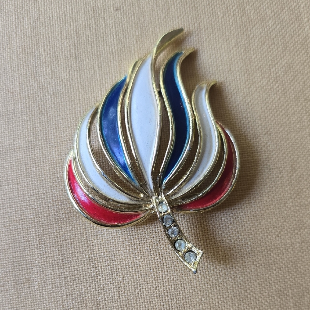 Elegant Gold, Red, Blue, and White Brooch